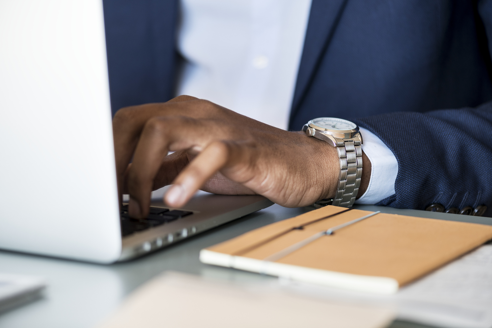 Black man using laptop